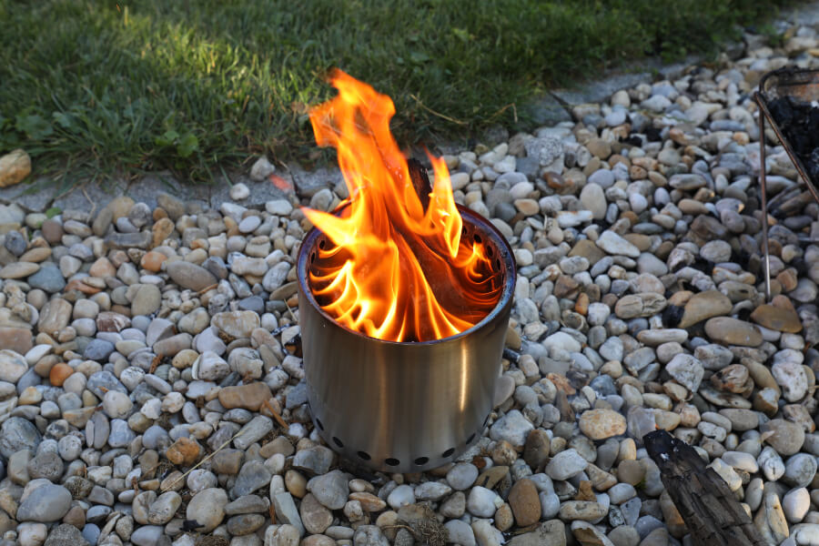 Smokeless fire pit on rocks