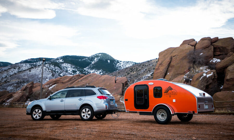 An outback towing a Classic Timberleaf trailer