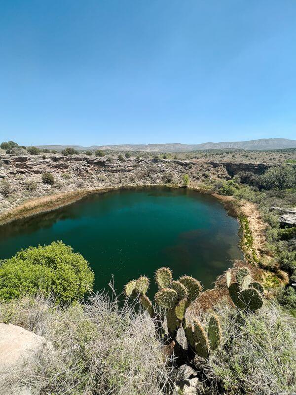 Montezuma Well which you can see on your road trip from Phoenix to the Grand Canyon