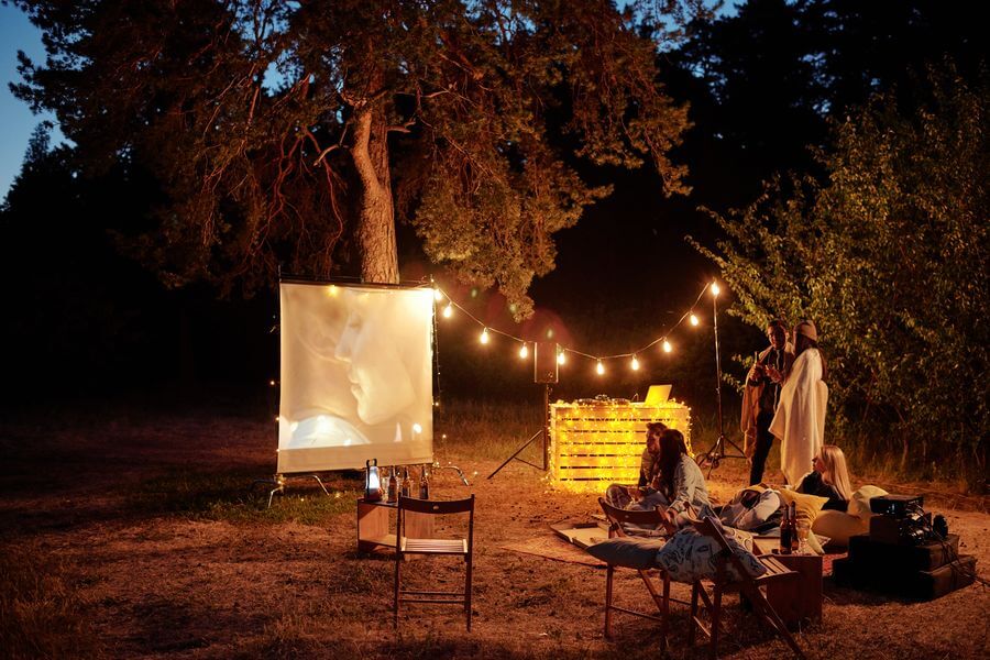 A movie projector as part of an RV campsite setup