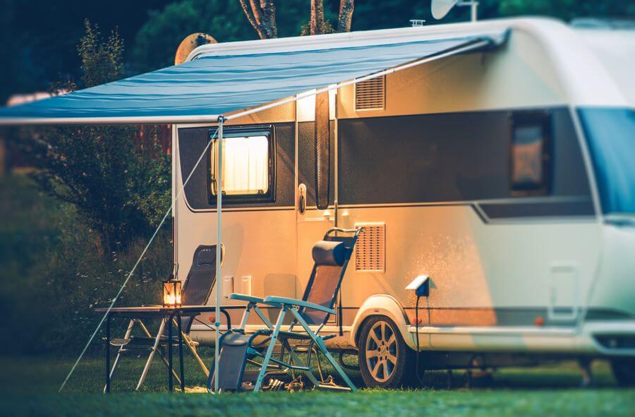 An RV campsite setup idea featuring an awning