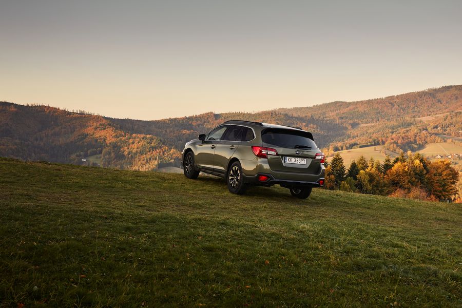 A Subaru Outback after towing a camper trailer