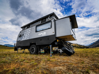 A pop-up camper with a bathroom and shower