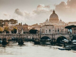 A view of the Vatican and the River Tiber at sunset during a three day trip to Rome