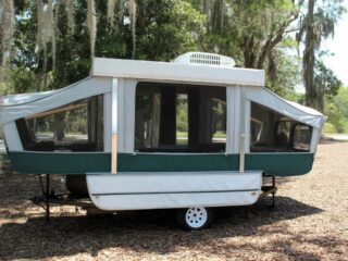 A pop-up camper that has been improved using a number of neat hacks