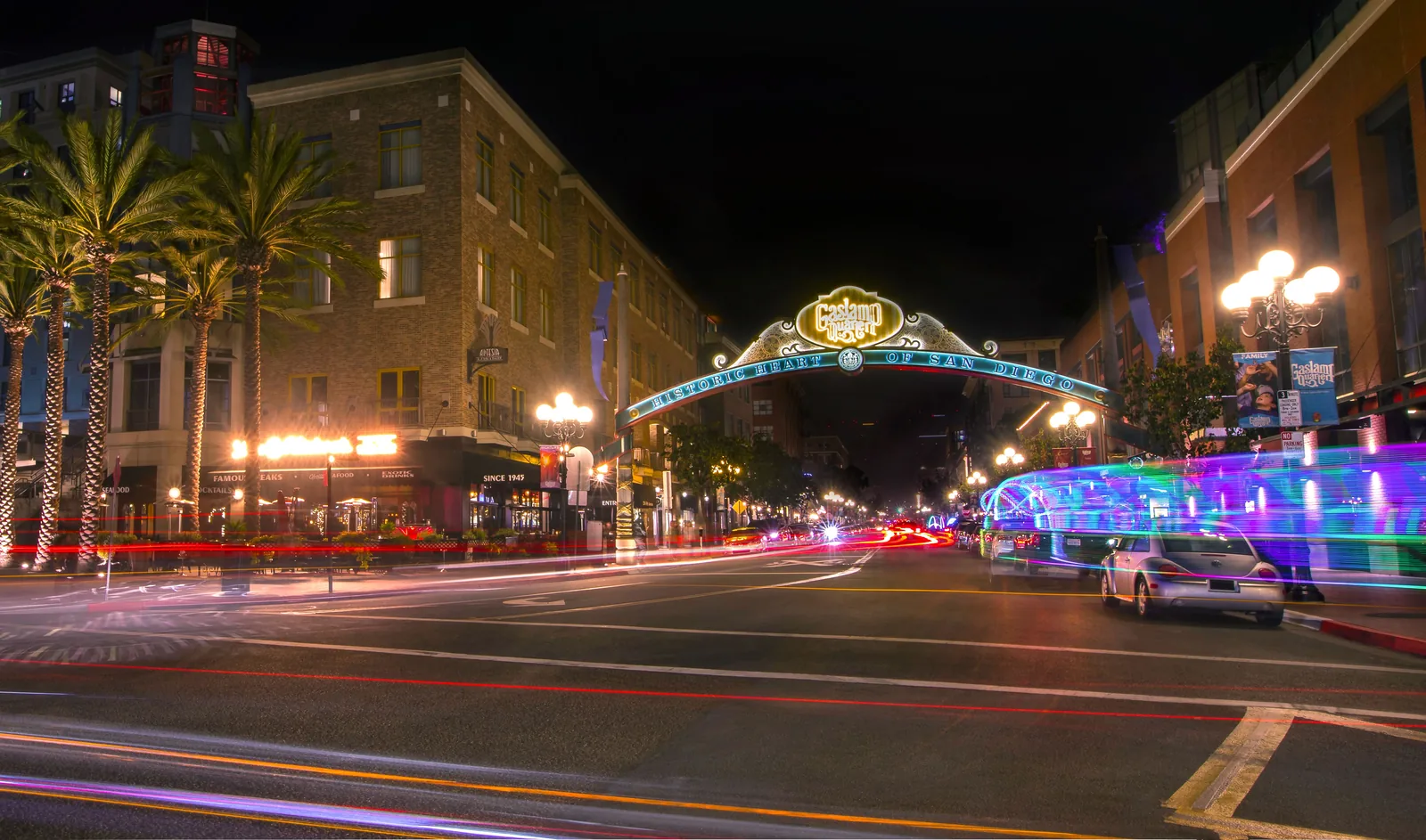The Gaslamp Quarter sign lit up at night in downtown San Diego