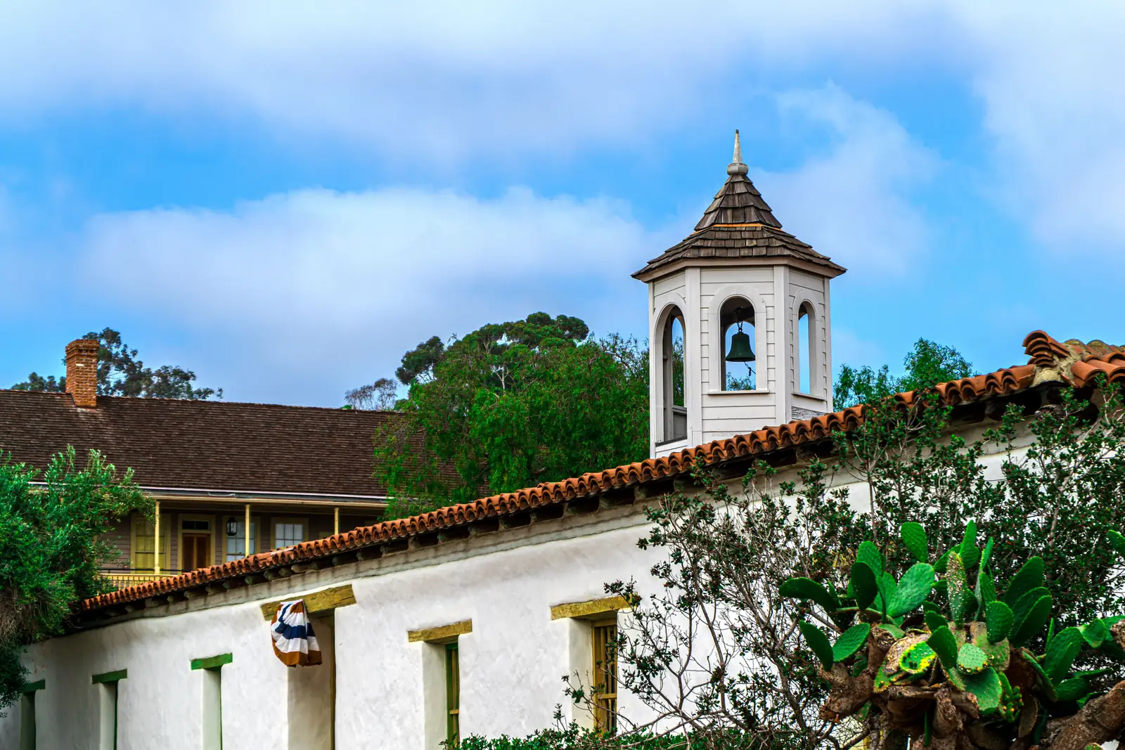 Historic adobe building and bell tower in Old Town San Diego