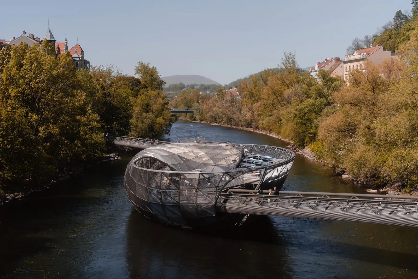 The Murinsel, a steel and glass artificial island in the Mur river in Graz, linked to both banks by walkways