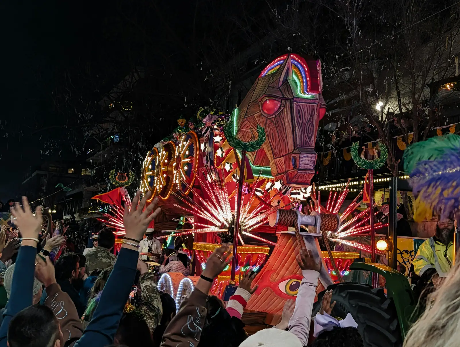 Illuminated Mardi Gras parade float at night in New Orleans