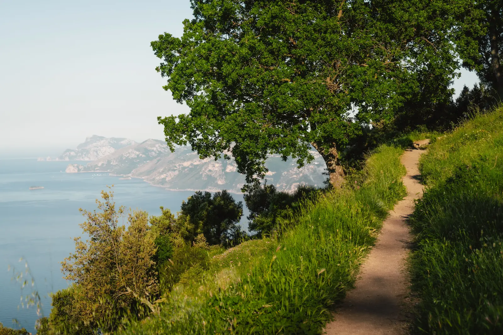 The Path of the Gods trail winding along the cliffs above the Amalfi Coast