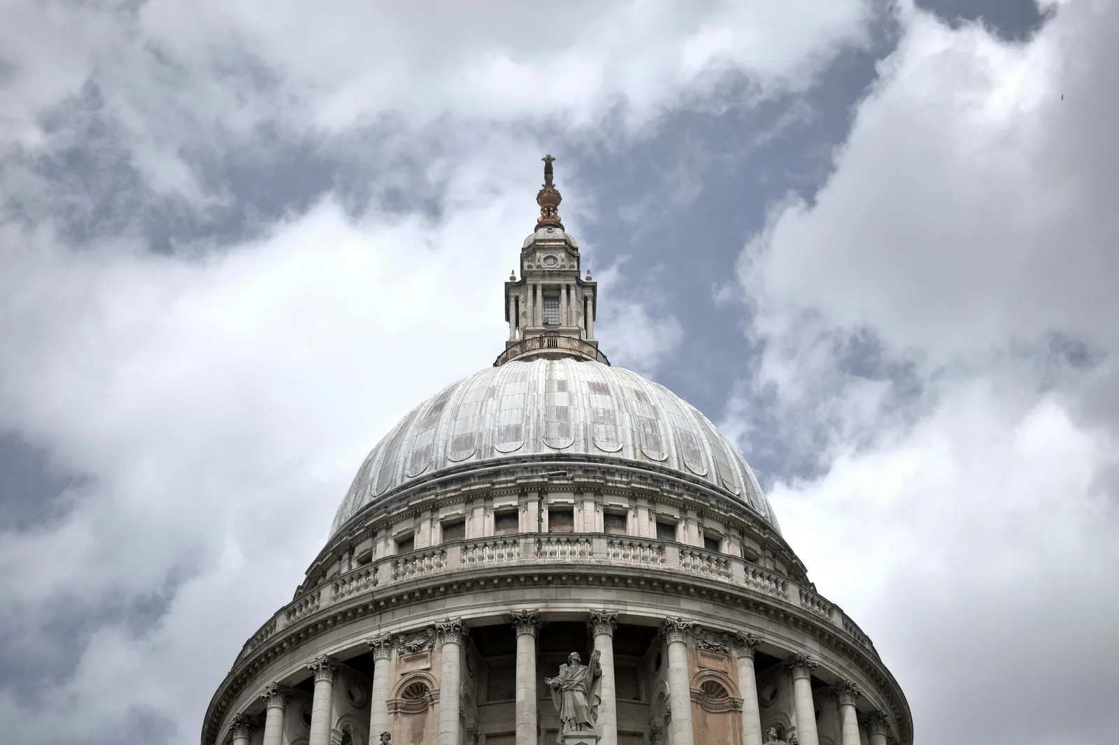 The dome of St Paul's Cathedral against a cloudy sky
