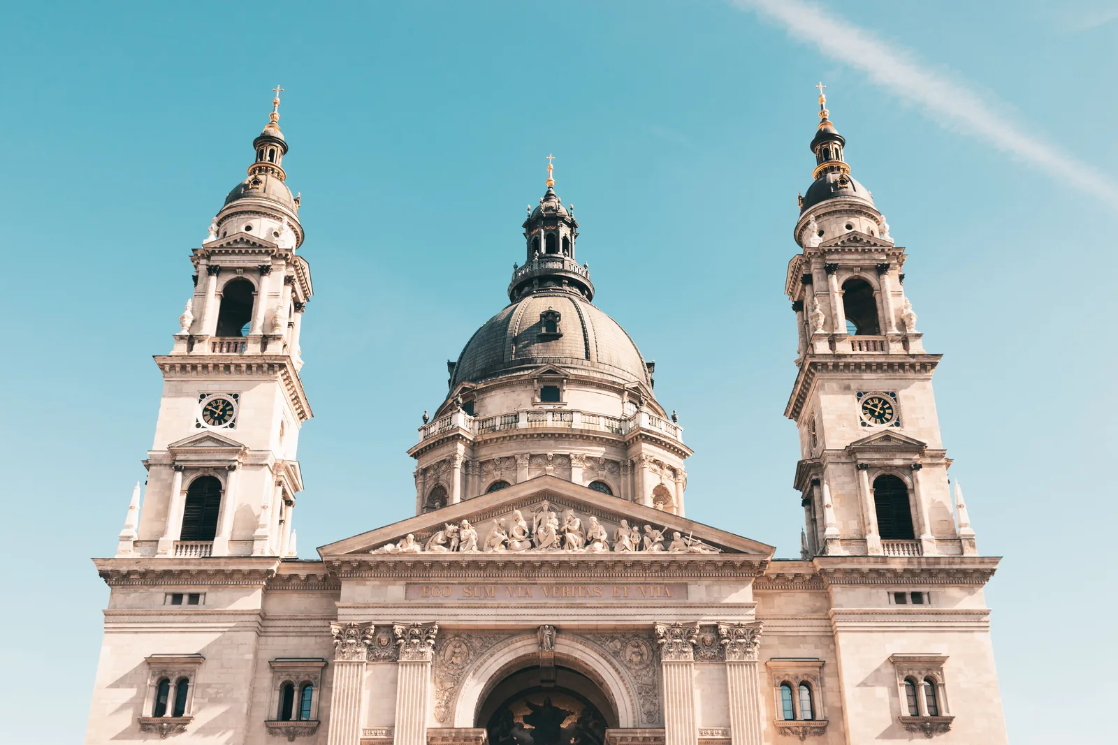 The facade and twin bell towers of St. Stephen's Basilica in Budapest