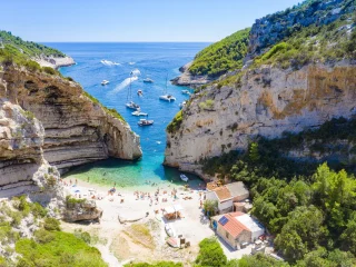 Aerial view of Stiniva cove and its narrow opening to the sea on Vis, Croatia