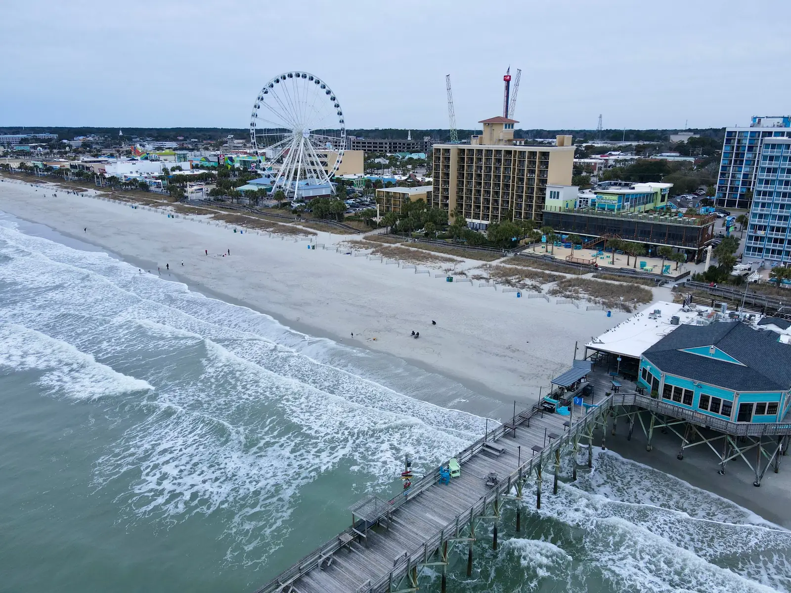 The Myrtle Beach oceanfront from above with the pier and the SkyWheel
