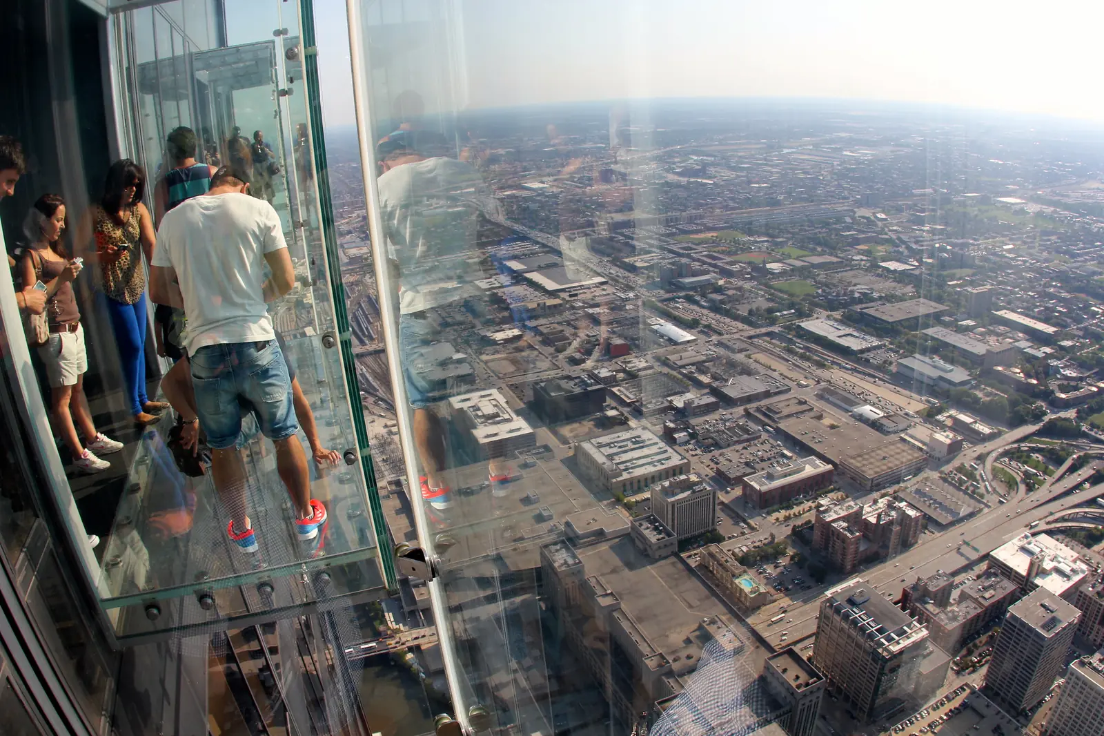 Looking straight down over Chicago from the glass Ledge at the Willis Tower Skydeck
