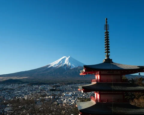 Chureito Pagoda with Mount Fuji rising behind it on a clear morning