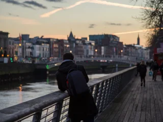 The Ha'penny Bridge arching over the River Liffey in Dublin