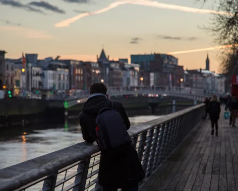The Ha'penny Bridge arching over the River Liffey in Dublin