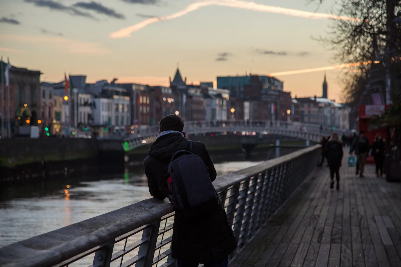 The Ha'penny Bridge arching over the River Liffey in Dublin