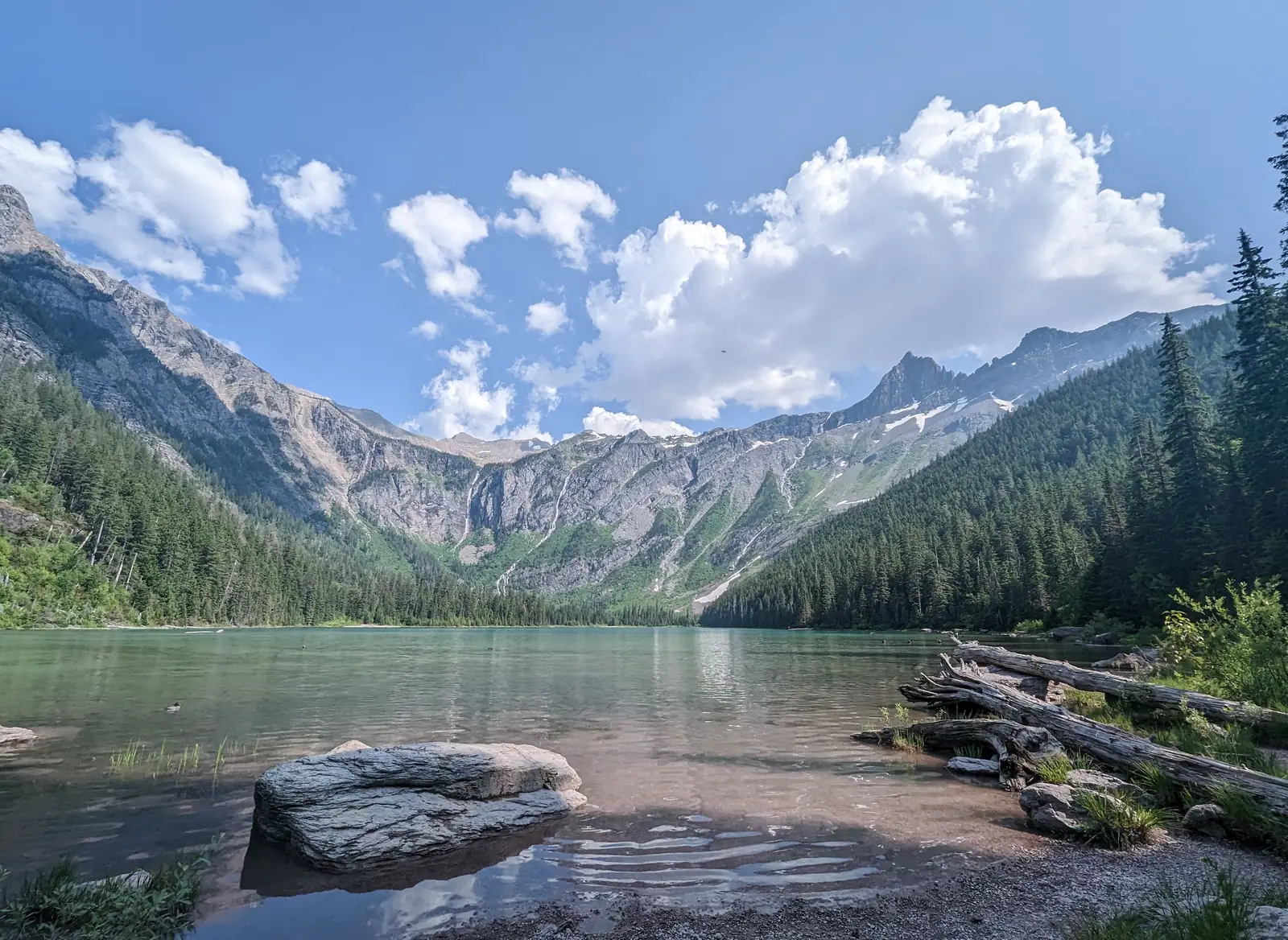 Avalanche Lake below its steep cliff walls in Glacier National Park