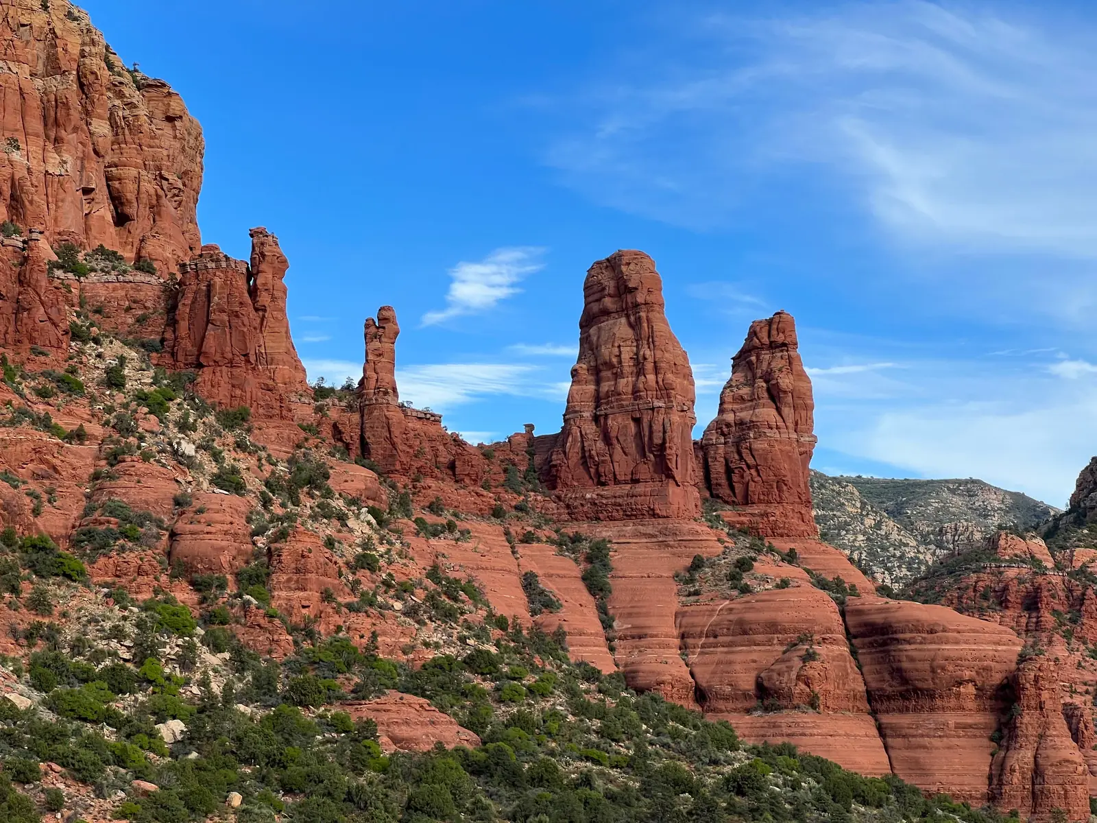 Red rock formations rising above the desert in Sedona Arizona
