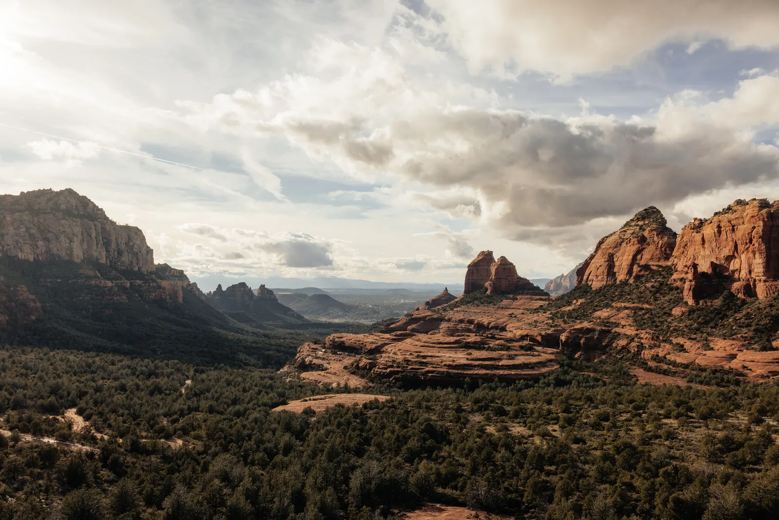 Red rock walls closing in around a canyon in Sedona Arizona