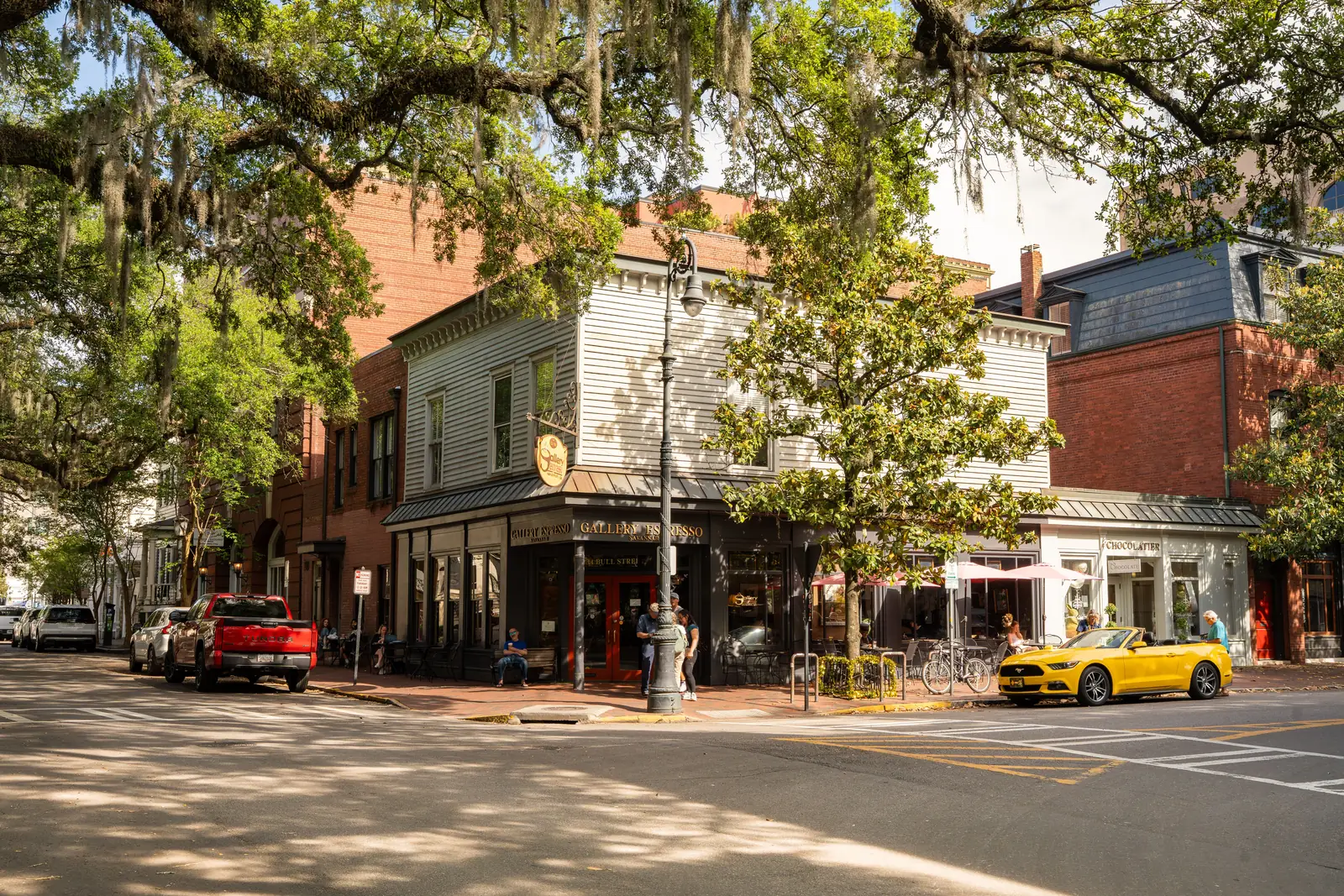 A street corner of shops and cafes in downtown Savannah