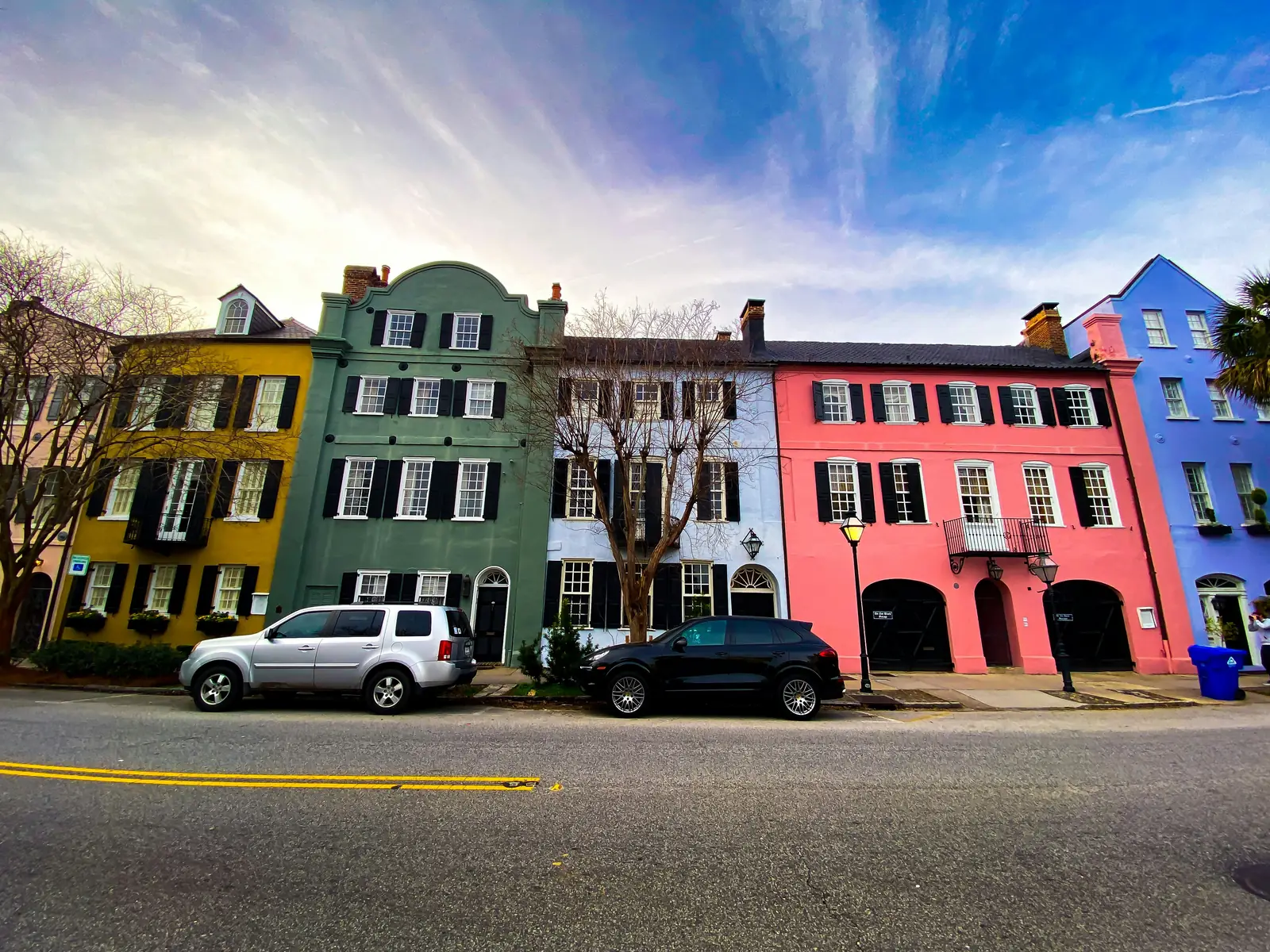 The pastel houses of Rainbow Row on a sunny day in Charleston, South Carolina