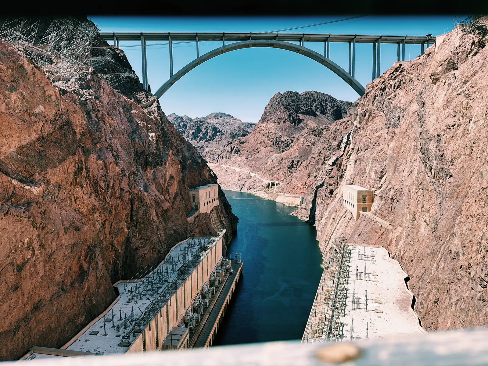 The Colorado River running green through Black Canyon below the bypass bridge