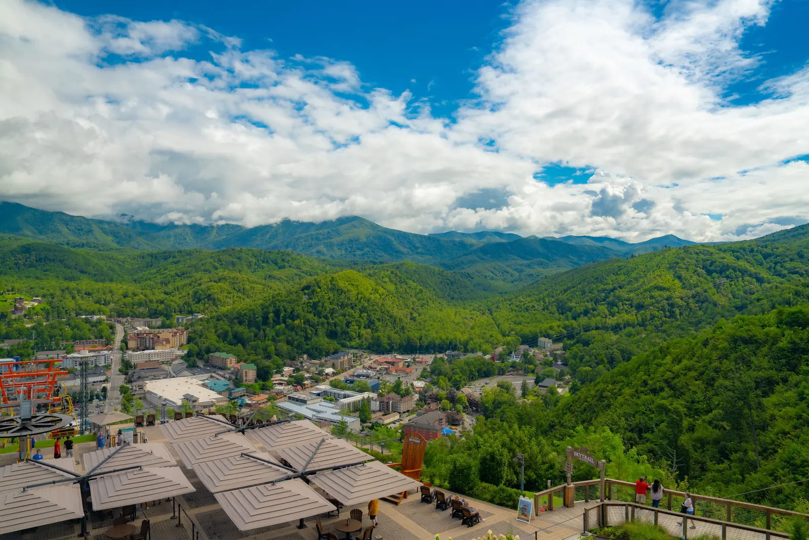 Looking out over Gatlinburg and the surrounding mountains from a hilltop viewing deck