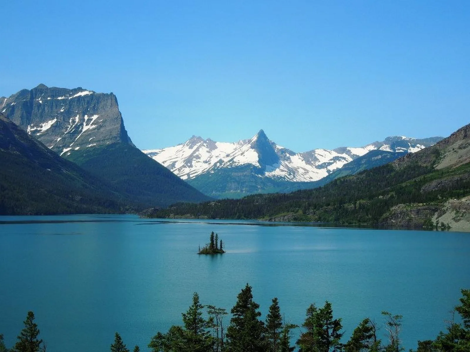 Turquoise water and snow capped peaks at St. Mary Lake in Glacier National Park