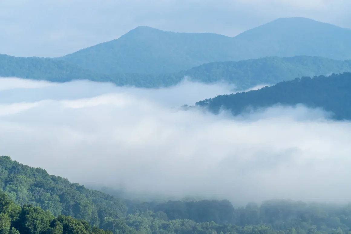 Layers of blue ridges rising above low cloud in the Great Smoky Mountains