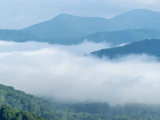Layers of blue ridges rising above low cloud in the Great Smoky Mountains
