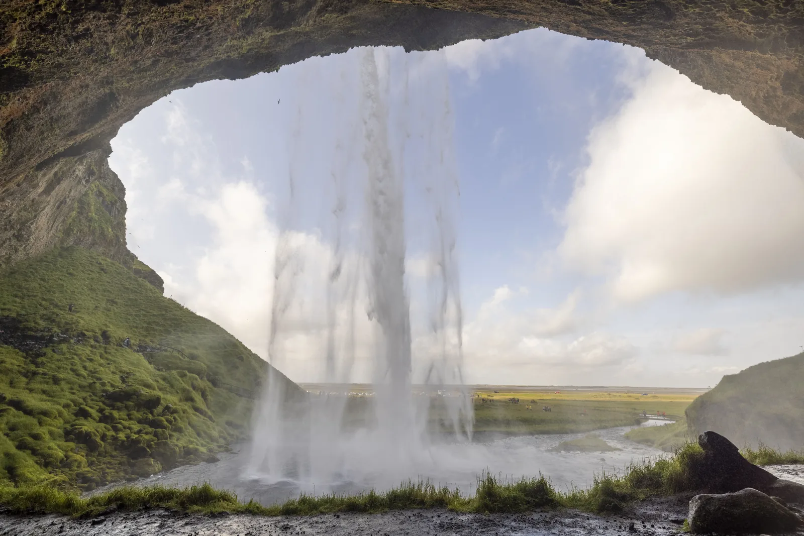 The view out from the path behind Seljalandsfoss waterfall
