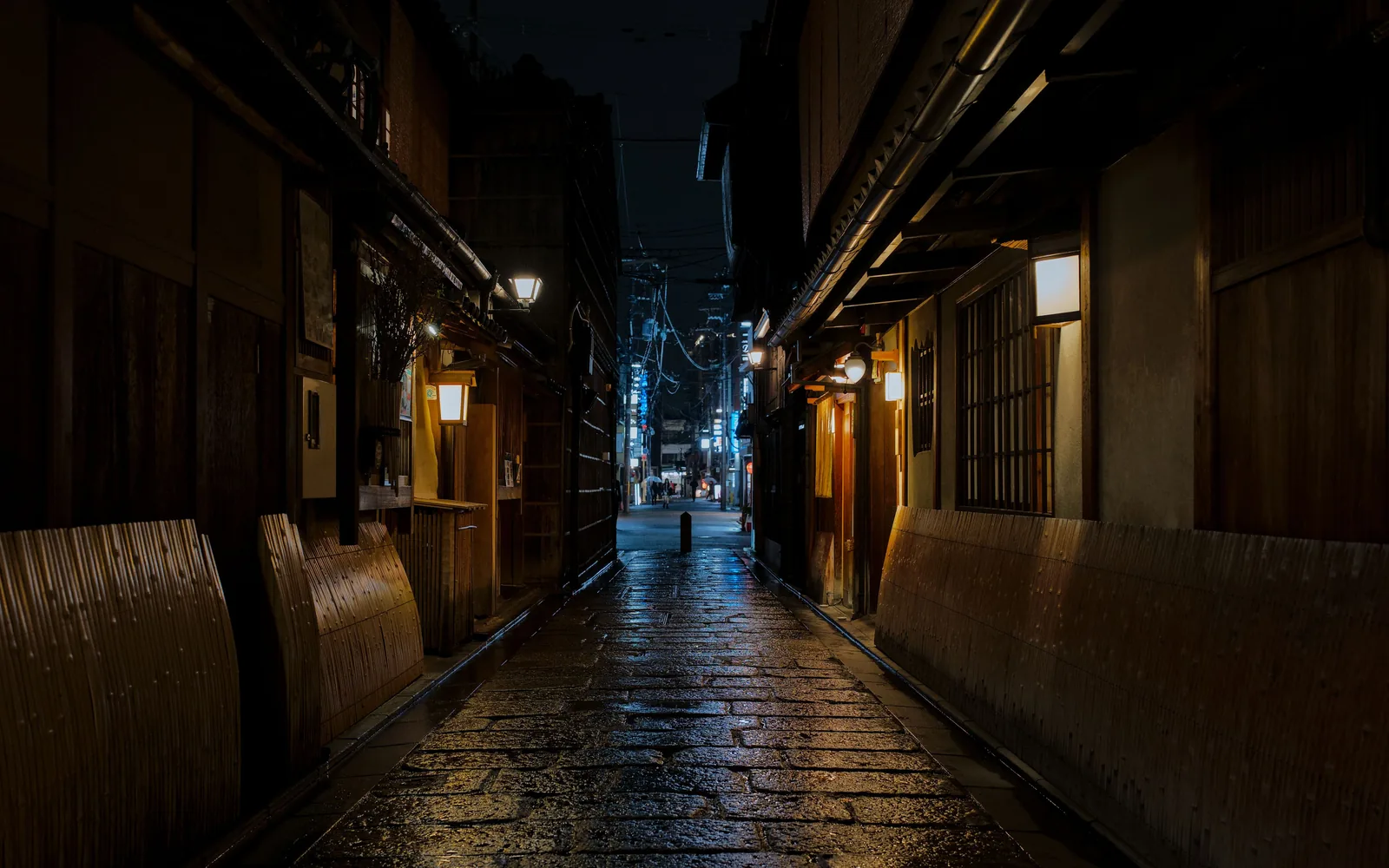A quiet wooden lined street in the Gion district of Kyoto after dark