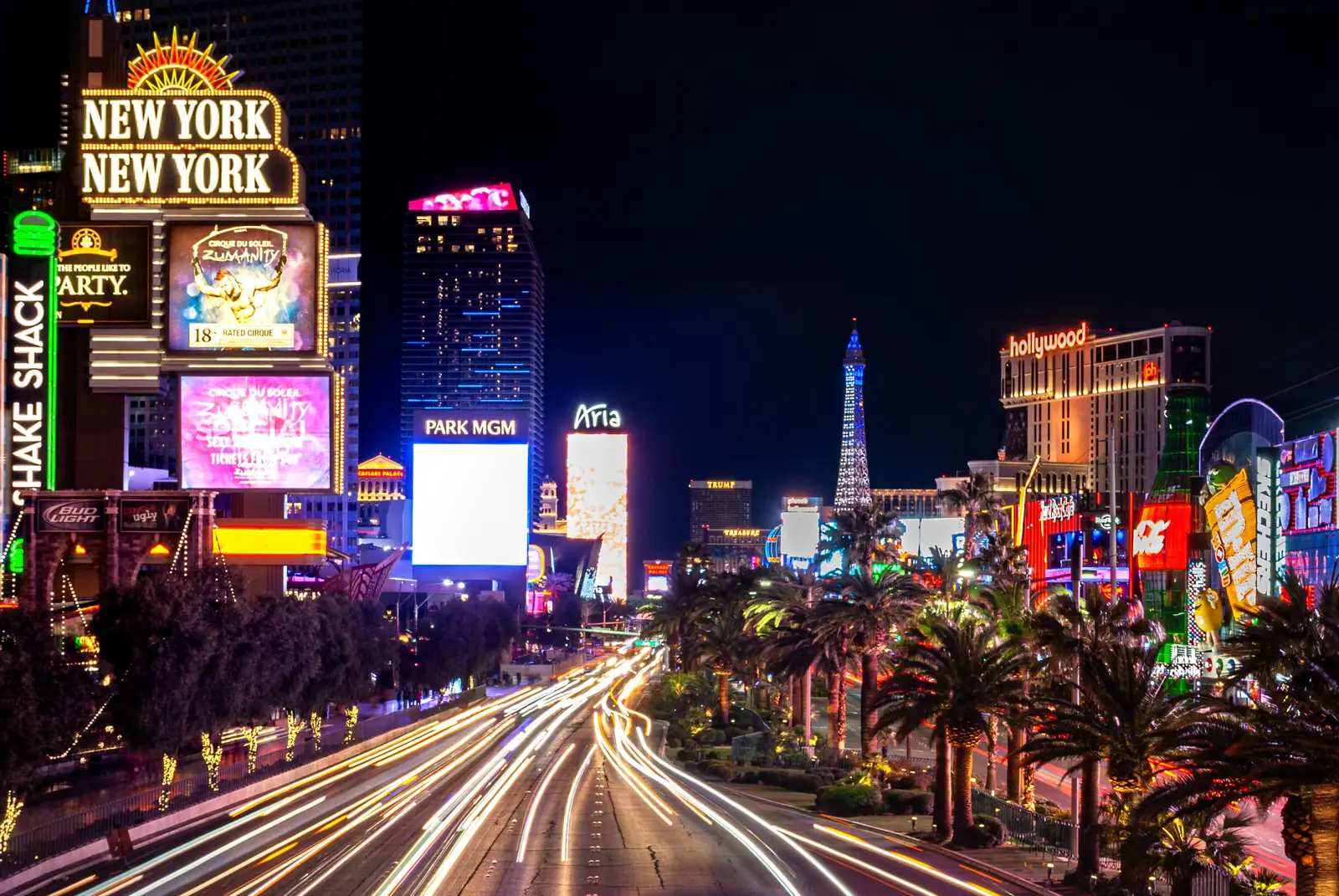 Traffic light trails running down the Las Vegas Strip at night