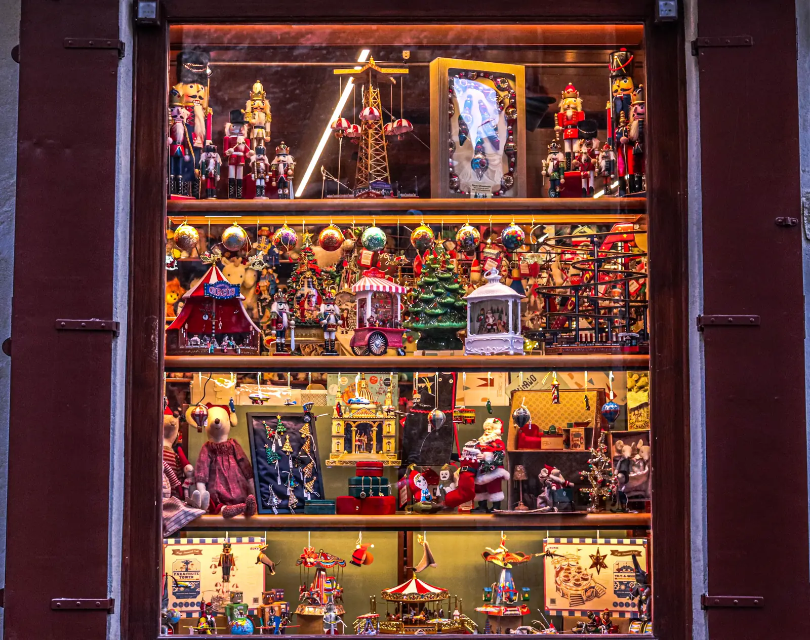 A Christmas toy shop window filled with nutcrackers and festive displays