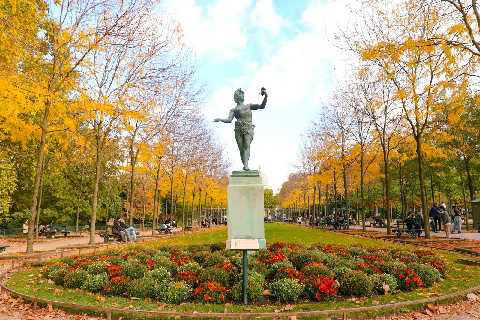 Autumn trees and a statue in the Jardin du Luxembourg in Paris