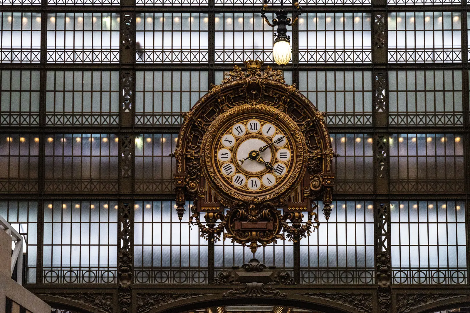 The ornate golden clock inside the Musee d'Orsay in Paris