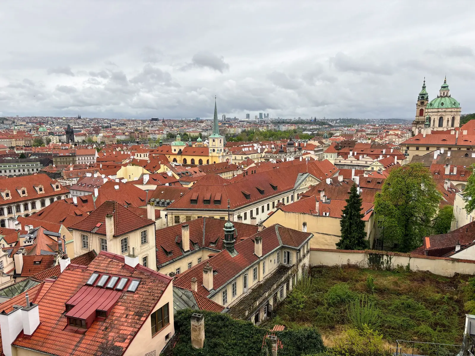 A view over the red rooftops of Prague from above