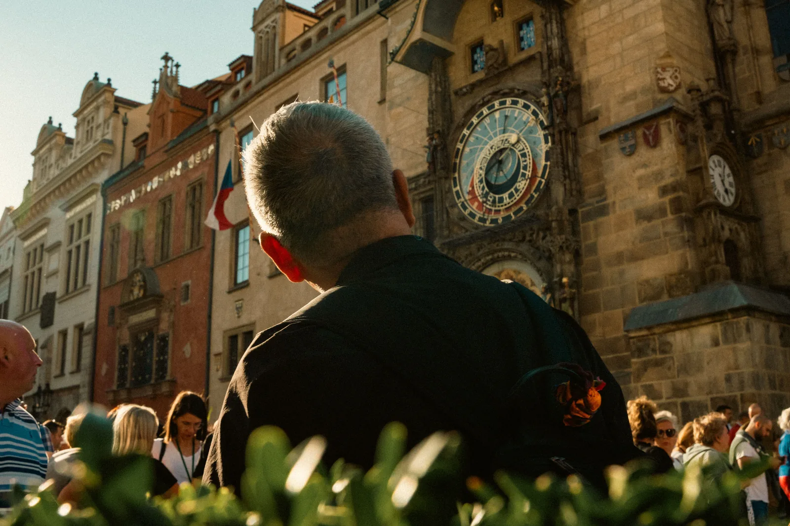 A crowd watching the astronomical clock on the Old Town Hall in Prague