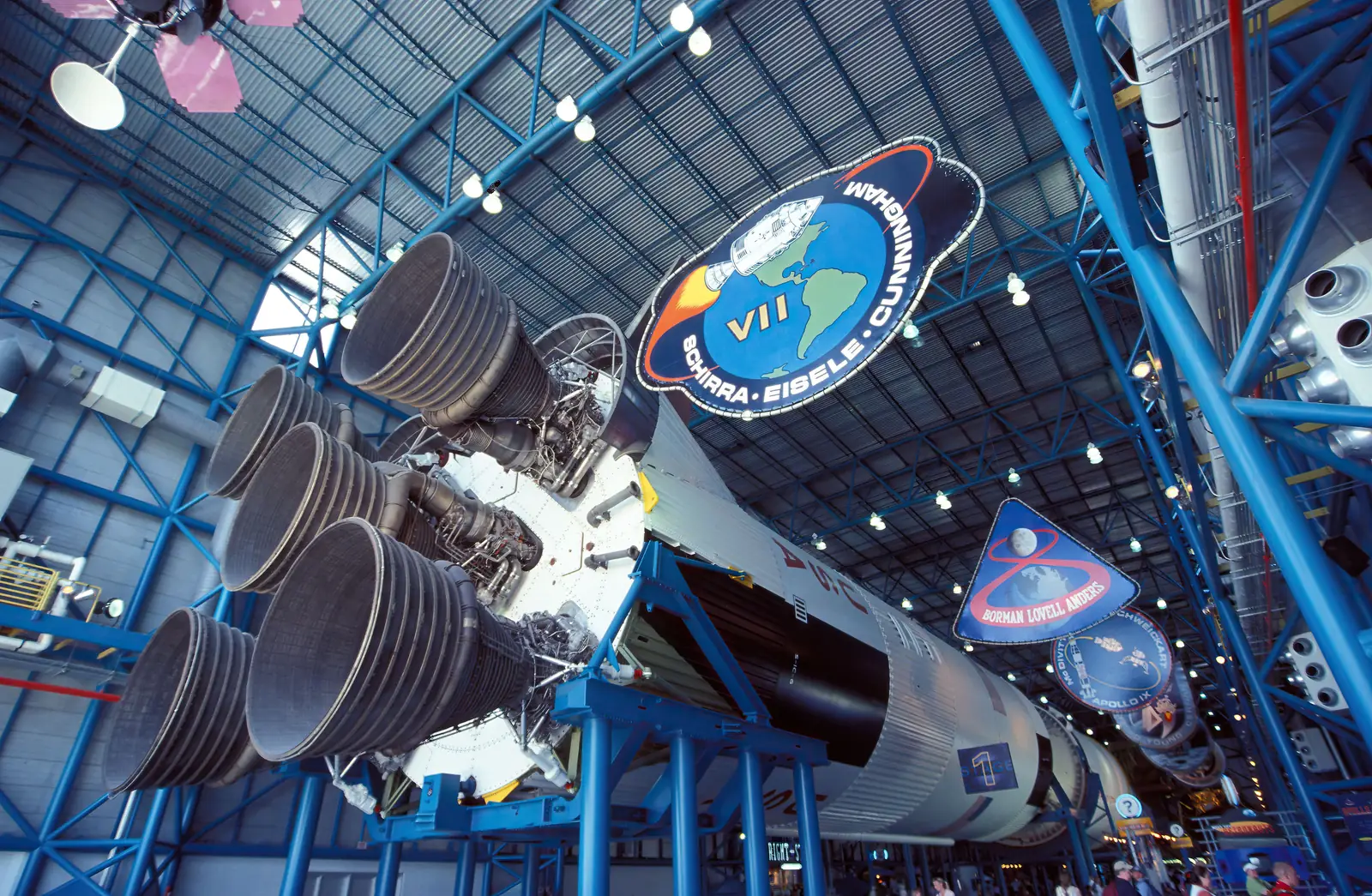 The Saturn V rocket suspended overhead in the Apollo hall at Kennedy Space Center