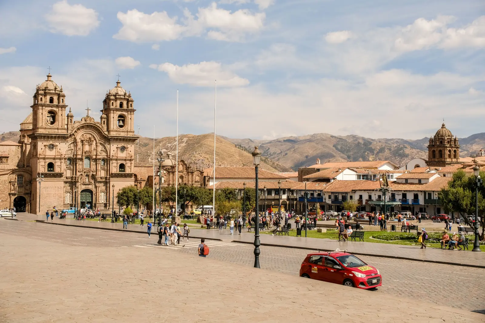 The cathedral on the Plaza de Armas in Cusco with mountains behind it