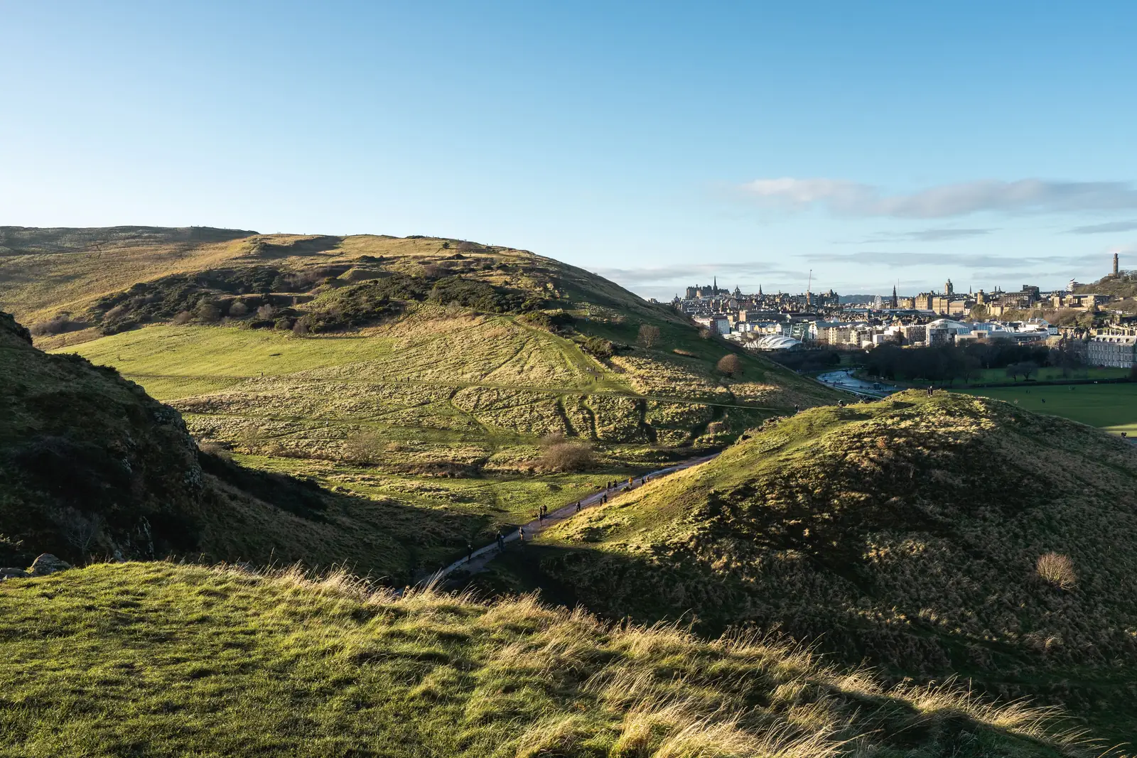 The hills of Holyrood Park with Edinburgh spread out beyond them