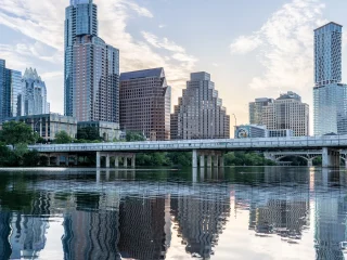 The Austin skyline reflected in Lady Bird Lake at daybreak