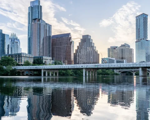 The Austin skyline reflected in Lady Bird Lake at daybreak