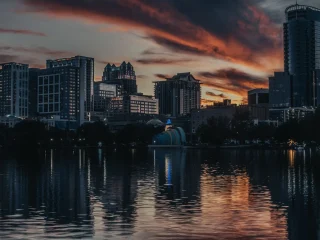 The downtown Orlando skyline reflected in Lake Eola at sunset