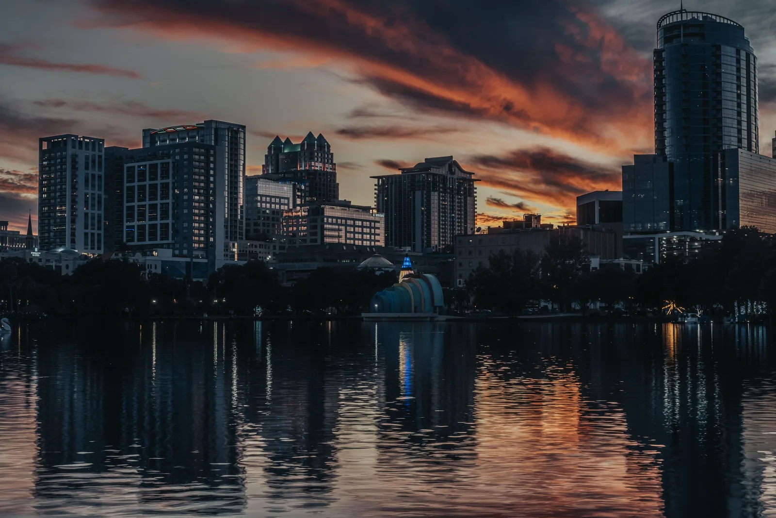 The downtown Orlando skyline reflected in Lake Eola at sunset