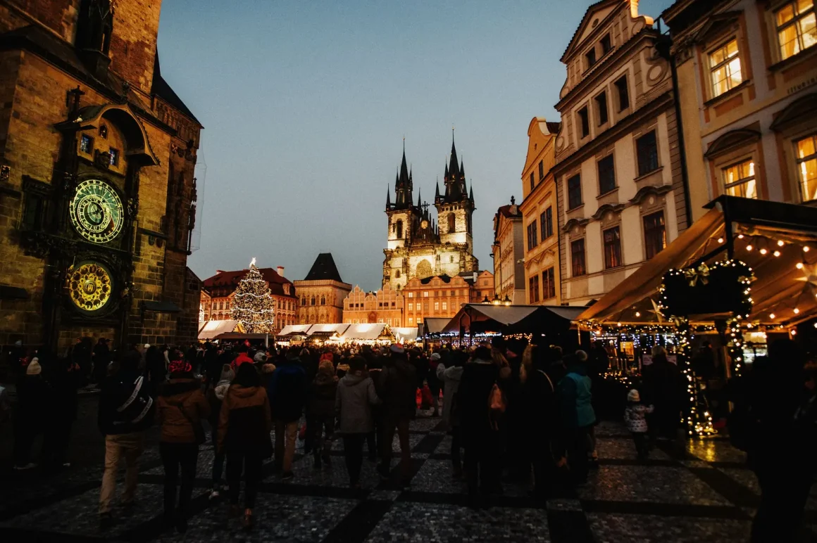 The Christmas market in Old Town Square in Prague at dusk