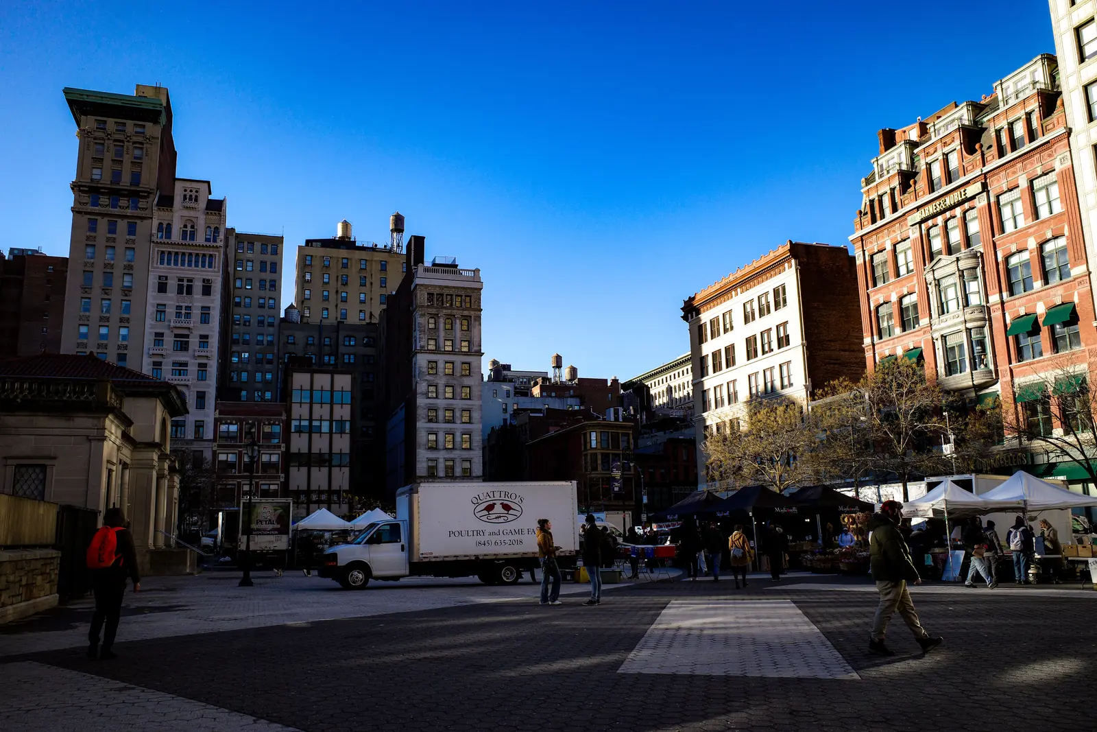 Market stalls and crowds at Union Square in New York City